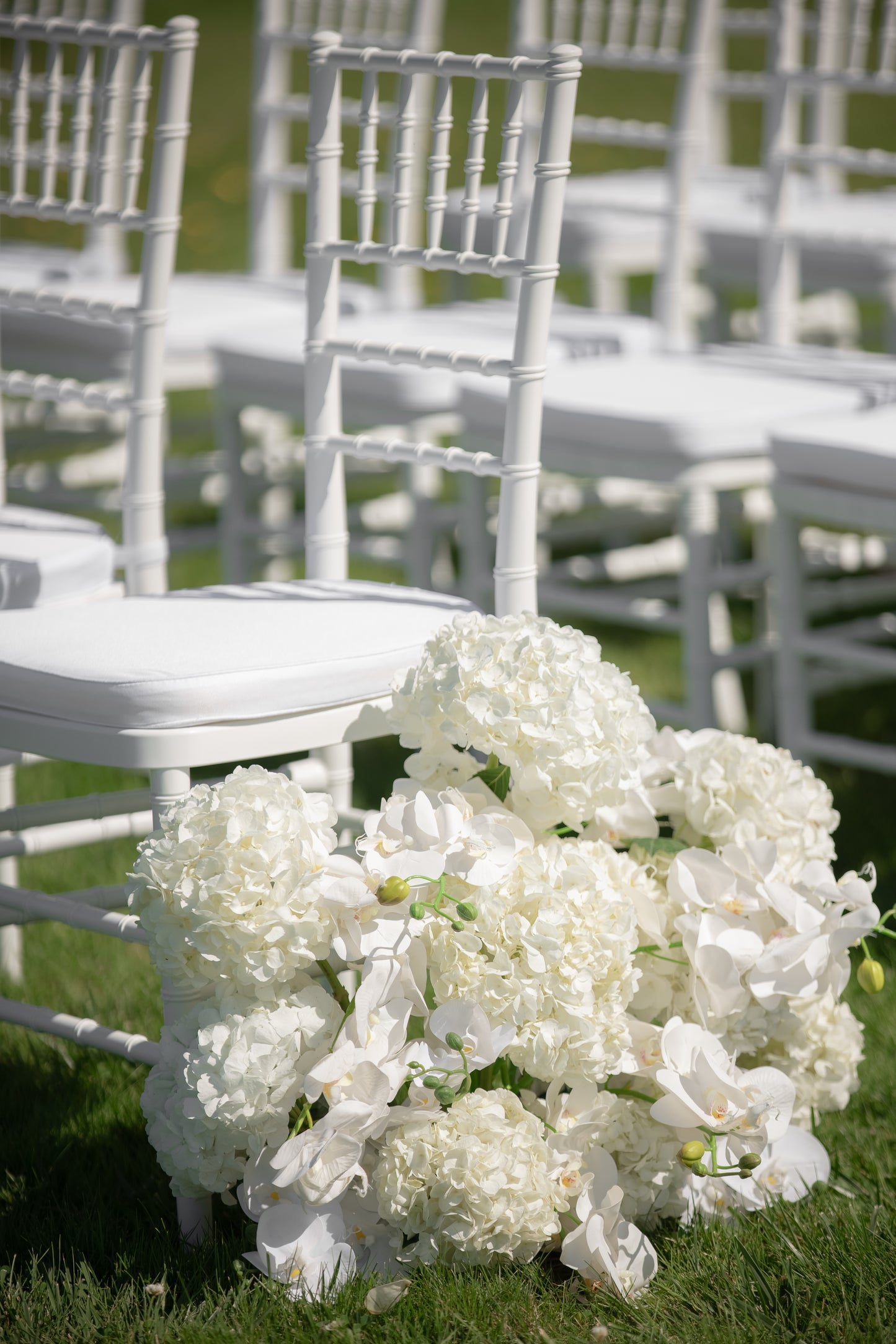 Hydrangea and Orchid Aisle Arrangement
